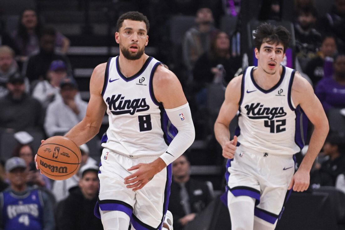 Jan 21, 2026; Sacramento, California, USA; Sacramento Kings guard Zach LaVine (8) pushes the ball up the court during the first quarter of the game against the Toronto Raptors at Golden 1 Center. Mandatory Credit: Ed Szczepanski-Imagn Images