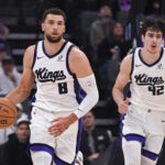 Jan 21, 2026; Sacramento, California, USA; Sacramento Kings guard Zach LaVine (8) pushes the ball up the court during the first quarter of the game against the Toronto Raptors at Golden 1 Center. Mandatory Credit: Ed Szczepanski-Imagn Images