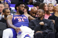 Mar 25, 2026; Philadelphia, Pennsylvania, USA; Philadelphia 76ers center Joel Embiid (21) and Tyrese Maxey (R) talk on the bench during the fourth quarter against the Chicago Bulls at Xfinity Mobile Arena. Mandatory Credit: Bill Streicher-Imagn Images