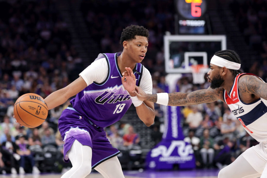 Mar 25, 2026; Salt Lake City, Utah, USA; Utah Jazz forward Ace Bailey (19) controls the ball as Washington Wizards guard Jaden Hardy (8) defends during the second half at Delta Center. Mandatory Credit: Chris Nicoll-Imagn Images
