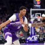 Mar 25, 2026; Salt Lake City, Utah, USA; Utah Jazz forward Ace Bailey (19) controls the ball as Washington Wizards guard Jaden Hardy (8) defends during the second half at Delta Center. Mandatory Credit: Chris Nicoll-Imagn Images