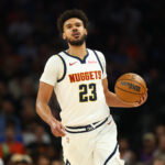 Mar 24, 2026; Phoenix, Arizona, USA; Denver Nuggets forward Cameron Johnson (23) against the Phoenix Suns at Mortgage Matchup Center. Mandatory Credit: Mark J. Rebilas-Imagn Images
