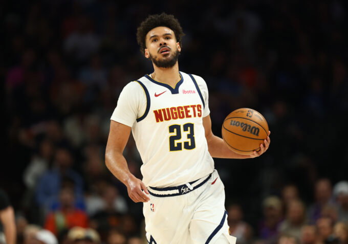 Mar 24, 2026; Phoenix, Arizona, USA; Denver Nuggets forward Cameron Johnson (23) against the Phoenix Suns at Mortgage Matchup Center. Mandatory Credit: Mark J. Rebilas-Imagn Images