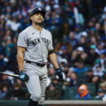 Mar 30, 2026; Seattle, Washington, USA; New York Yankees designated hitter Giancarlo Stanton (27) reacts following a strikeout against the Seattle Mariners during the second inning at T-Mobile Park. Mandatory Credit: Joe Nicholson-Imagn Images
