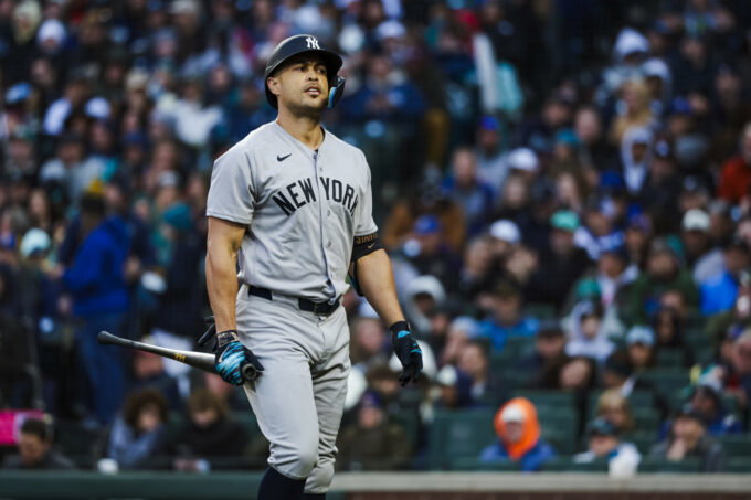 Mar 30, 2026; Seattle, Washington, USA; New York Yankees designated hitter Giancarlo Stanton (27) reacts following a strikeout against the Seattle Mariners during the second inning at T-Mobile Park. Mandatory Credit: Joe Nicholson-Imagn Images