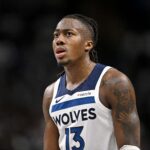 Mar 30, 2026; Dallas, Texas, USA; Minnesota Timberwolves guard Ayo Dosunmu (13) looks on during the second half against the Dallas Mavericks at the American Airlines Center. Mandatory Credit: Jerome Miron-Imagn Images