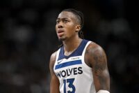 Mar 30, 2026; Dallas, Texas, USA; Minnesota Timberwolves guard Ayo Dosunmu (13) looks on during the second half against the Dallas Mavericks at the American Airlines Center. Mandatory Credit: Jerome Miron-Imagn Images