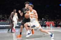 Apr 3, 2026; Brooklyn, New York, USA; Atlanta Hawks guard Dyson Daniels (5) drives the ball against Brooklyn Nets guard Nolan Traore (88) during the second half at Barclays Center. Mandatory Credit: Gregory Fisher-Imagn Images