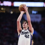 Apr 12, 2026; Portland, Oregon, USA; Sacramento Kings center Maxime Raynaud (42) shoots a free throw during the second half against the Portland Trail Blazers at Moda Center. Mandatory Credit: Troy Wayrynen-Imagn Images