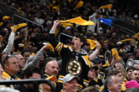 Apr 23, 2026; Boston, Massachusetts, USA; A Boston Bruins fan cheers against the Buffalo Sabres during the first period of game three of the first round of the 2026 Stanley Cup Playoffs at the TD Garden. Mandatory Credit: Brian Fluharty-Imagn Images