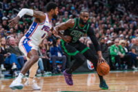 Apr 28, 2026; Boston, Massachusetts, USA; Boston Celtics guard Jaylen Brown (7) drives the ball against Philadelphia 76ers forward Paul George (8) in the second half during game five of the first round of the 2026 NBA Playoffs at TD Garden. Mandatory Credit: David Butler II-Imagn Images