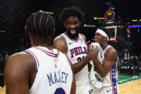 May 2, 2026; Boston, Massachusetts, USA; Philadelphia 76ers center Joel Embiid (21) celebrates with guard Tyrese Maxey (0) and guard Vj Edgecombe (77)] following their win over the Boston Celtics in game seven of the first round of the 2026 NBA Playoffs at TD Garden. Mandatory Credit: Winslow Townson-Imagn Images