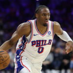 May 8, 2026; Philadelphia, Pennsylvania, USA; Philadelphia 76ers guard Tyrese Maxey (0) controls the ball against the New York Knicks during the third quarter of game three of the second round of the 2026 NBA Playoffs at Xfinity Mobile Arena. Mandatory Credit: Bill Streicher-Imagn Images