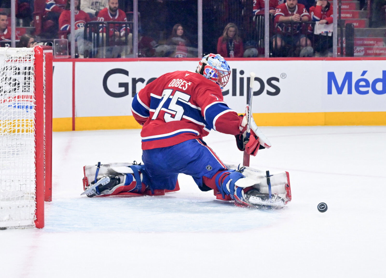 May 10, 2026; Montreal, Quebec, CAN; Montreal Canadiens goalie Jakub Dobes (75) makes a pad save during the second period against the Buffalo Sabres in game three of the second round of the 2026 Stanley Cup Playoffs at the Bell Centre. Mandatory Credit: Eric Bolte-Imagn Images