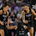 May 25, 2026; San Francisco, California, USA; Golden State Valkyries guard Veronica Burton (22) and forward Gabby Williams (1) help up guard Kaila Charles (6) against the Connecticut Sun in the second quarter at Chase Center. Mandatory Credit: Eakin Howard-Imagn Images