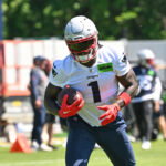 Jun 9, 2026; Foxborough, MA, USA; New England Patriots wide receiver A.J. Brown (1) runs after the catch at minicamp at Gillette Stadium. Mandatory Credit: