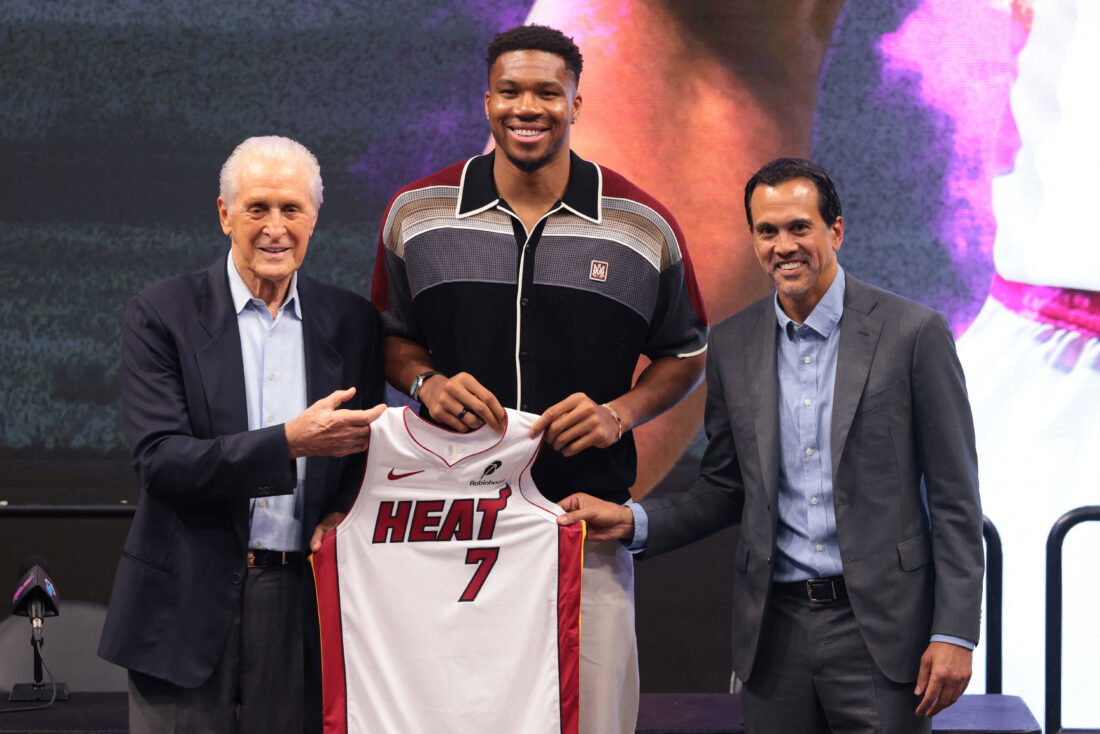 Jul 16, 2026; Miami, FL, USA; Miami Heat forward Giannis Antetokounmpo (7) is introduced as a new member of the team by Miami Heat president Pat Riley (left) and head coach Erik Spoelstra (right) during a press conference at Kaseya Center. Mandatory Credit: Sam Navarro-Imagn Images