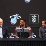 Jul 16, 2026; Miami, FL, USA; Miami Heat forward Giannis Antetokounmpo (7) is introduced as a new member of the team by Miami Heat president Pat Riley (left) and head coach Erik Spoelstra (right) during a press conference at Kaseya Center. Mandatory Credit: Sam Navarro-Imagn Images