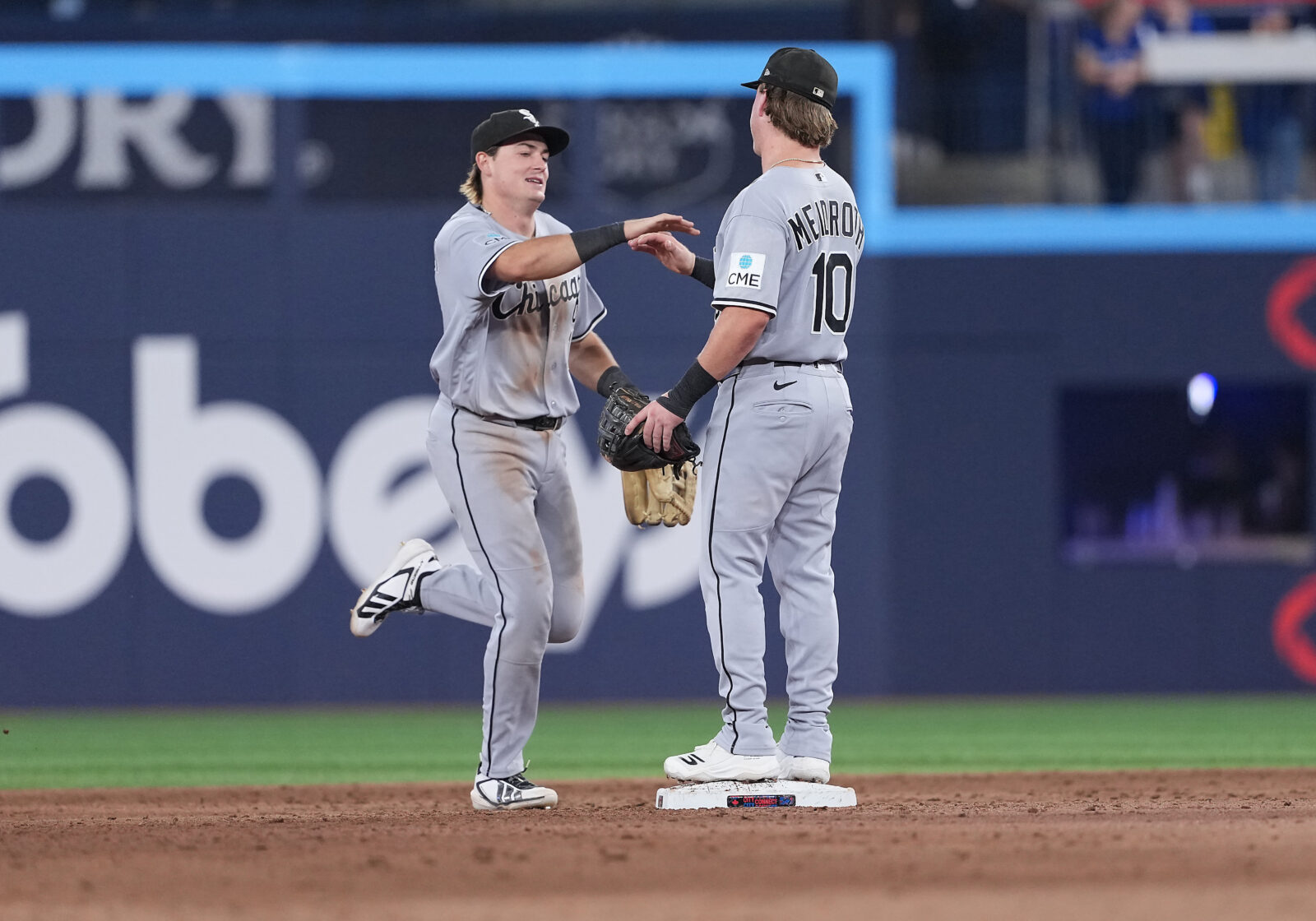Jul 17, 2026; Toronto, Ontario, CAN; Chicago White Sox left fielder Sam Antonacci (17) celebrates with second baseman Chase Meidroth (10) after defeating the Toronto Blue Jays in the ninth inning at Rogers Centre. Mandatory Credit: Nick Turchiaro-Imagn Images