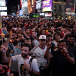 Soccer Football - FIFA World Cup 2026 - Final - Spain v Argentina - Fans gather in New York City - New York City, New York, U.S. - July 19, 2026 Spain fans celebrate at Times Square as Spain wins the World Cup REUTERS/Ed Ou