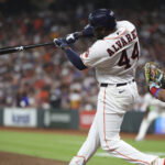 Aug 1, 2026; Houston, Texas, USA; Houston Astros designated hitter Yordan Alvarez (44) hits a double during the third inning against the Texas Rangers at Daikin Park. Mandatory Credit: Troy Taormina-Imagn Images