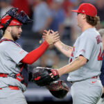 Aug 3, 2026; Bronx, New York, USA; St. Louis Cardinals catcher Jimmy Crooks (8) and relief pitcher Gordon Graceffo (44) celebrate after defeating the New York Yankees at Yankee Stadium. Mandatory Credit: Brad Penner-Imagn Images