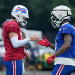 Bills quarterback Josh Allen and receiver Keon Coleman give their unique handshake between drills during the final day of Buffalo Bills training camp at St. John Fisher University Friday, August 7, 2026 in Pittsford. Credit: USA TODAY Network via Reuters Connect