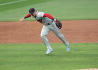 Aug 13, 2026; Dyersville, Iowa, USA; Philadelphia Phillies second baseman Bryson Stott (5) fields a ground ball against the Minnesota Twins at the Field of Dreams. Mandatory Credit: Reese Strickland-Imagn Images