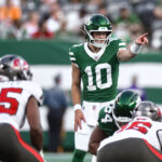 Aug 14, 2026; East Rutherford, New Jersey, USA; New York Jets quarterback Cade Klubnik (10) looks over the Tampa Bay defense during the first half at MetLife Stadium. Mandatory Credit: John Jones-Imagn Images