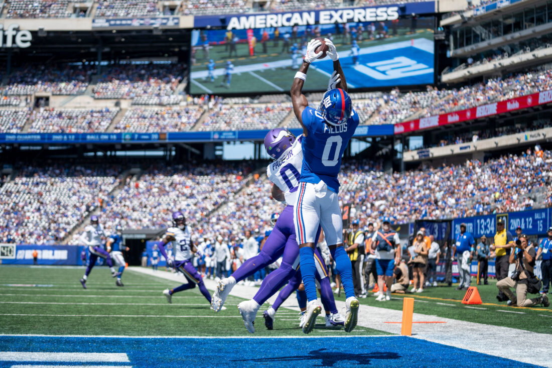 New York Giants wide receiver Malachi Fields (0) catches a touchdown pass from New York Giants quarterback Jaxson Dart (6) during a preseason opening game between the New York Giants and Minnesota Vikings on Saturday, Aug. 15, 2026, at MetLife Stadium in East Rutherford, NJ.