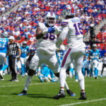 Aug 15, 2026; Orchard Park, New York, USA; Buffalo Bills defensive tackle Deone Walker (96) reacts to getting a sack with Buffalo Bills linebacker Greg Rousseau (15) during the first half at New Highmark Stadium. Mandatory Credit: Gregory Fisher-Imagn Images