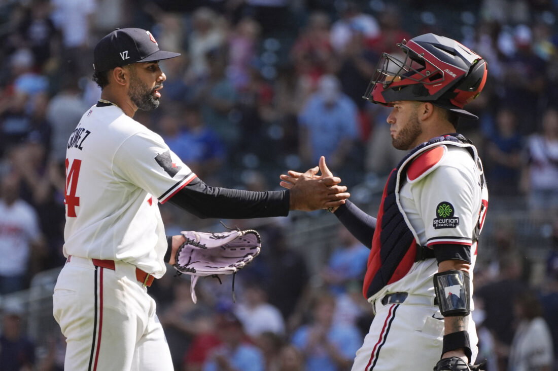 Aug 19, 2026; Minneapolis, Minnesota, USA; Minnesota Twins relief pitcher Yoendrys Gomez (94) celebrates with catcher Victor Caratini (37) the win over the Atlanta Braves after the ninth inning at Target Field. Mandatory Credit: Bruce Kluckhohn-Imagn Images