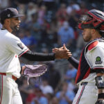 Aug 19, 2026; Minneapolis, Minnesota, USA; Minnesota Twins relief pitcher Yoendrys Gomez (94) celebrates with catcher Victor Caratini (37) the win over the Atlanta Braves after the ninth inning at Target Field. Mandatory Credit: Bruce Kluckhohn-Imagn Images