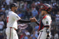 Aug 19, 2026; Minneapolis, Minnesota, USA; Minnesota Twins relief pitcher Yoendrys Gomez (94) celebrates with catcher Victor Caratini (37) the win over the Atlanta Braves after the ninth inning at Target Field. Mandatory Credit: Bruce Kluckhohn-Imagn Images