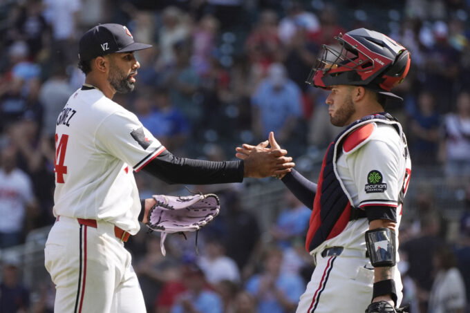 Aug 19, 2026; Minneapolis, Minnesota, USA; Minnesota Twins relief pitcher Yoendrys Gomez (94) celebrates with catcher Victor Caratini (37) the win over the Atlanta Braves after the ninth inning at Target Field. Mandatory Credit: Bruce Kluckhohn-Imagn Images