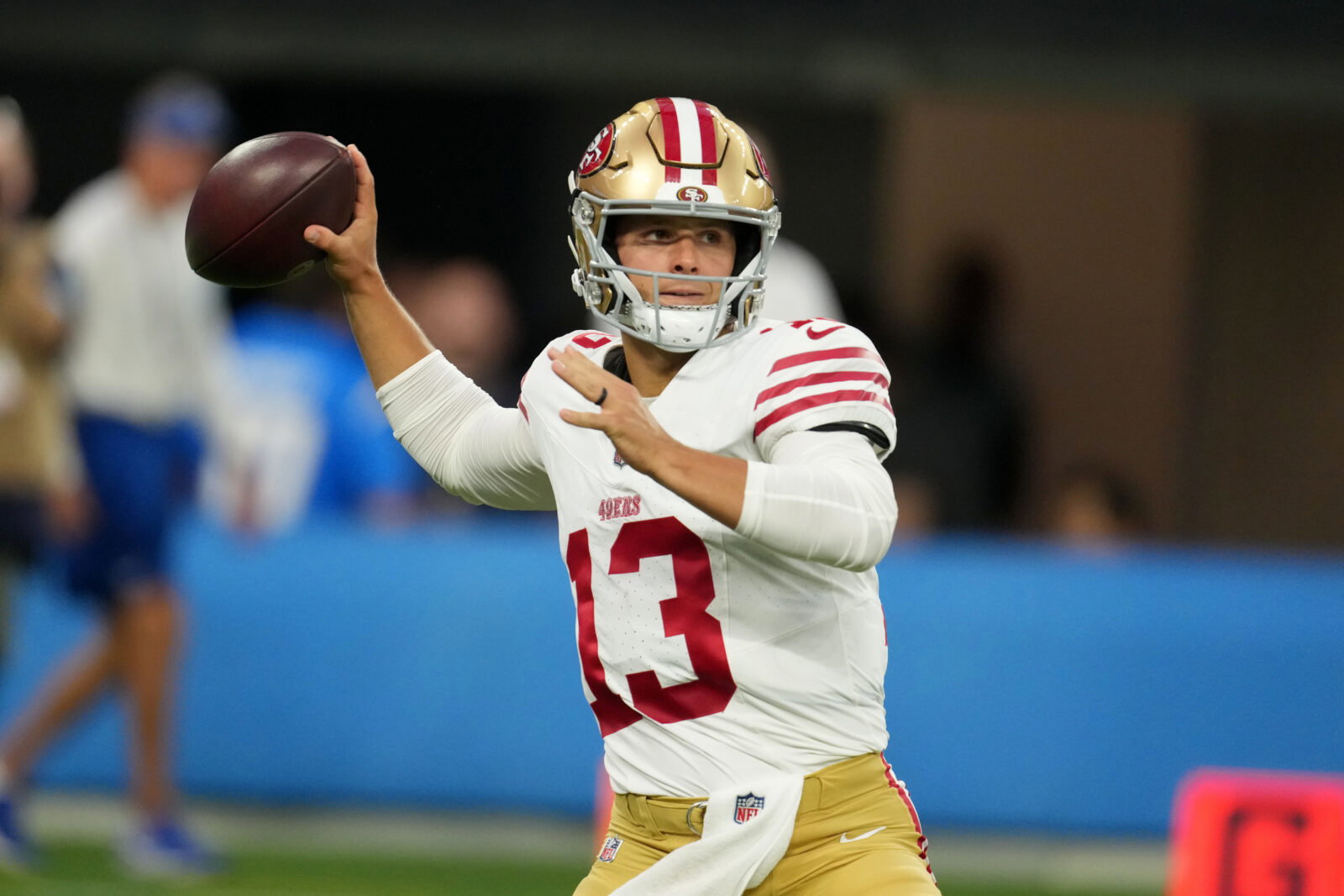 Aug 20, 2026; Inglewood, California, USA; San Francisco 49ers quarterback Brock Purdy (13) throws the ball against the Los Angeles Chargers in the first half at SoFi Stadium. Mandatory Credit: Kirby Lee-Imagn Images