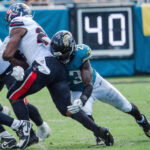 Jacksonville Jaguars linebacker Foye Oluokun (23) wraps up Houston Texans running back Nick Chubb (21) during the fourth quarter between the Houston Texans and the Jacksonville Jaguars Sunday September 21, 2025 at EverBank Stadium in Jacksonville, Fla. The Jaguars defeated the Texans 17-10. [Doug Engle/Florida Times-Union]