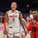 Aug 23, 2026; Portland, Oregon, USA; Washington Mystics center Shakira Austin (0) leaves the court after a win over the Portland Fire at Moda Center. Mandatory Credit: Soobum Im-Imagn Images