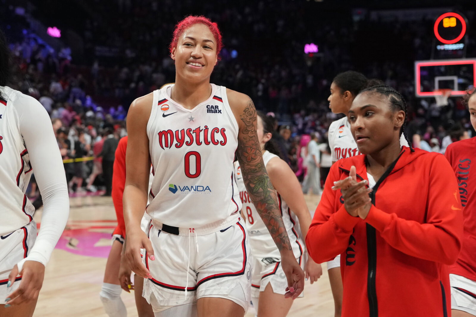 Aug 23, 2026; Portland, Oregon, USA; Washington Mystics center Shakira Austin (0) leaves the court after a win over the Portland Fire at Moda Center. Mandatory Credit: Soobum Im-Imagn Images