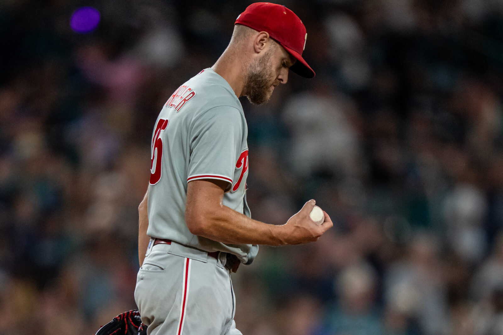 Aug 24, 2026; Seattle, Washington, USA; Philadelphia Phillies starting pitcher Zack Wheeler (45) reacts after giving up a home run during the fifth inning against the Seattle Mariners at T-Mobile Park. Mandatory Credit: Stephen Brashear-Imagn Images