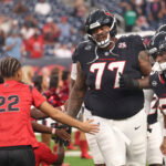 Aug 20, 2026; Houston, Texas, USA; Houston Texans offensive tackle Trent Brown (77) and teammates enters the field out of the tunnel before the Texans play the Las Vegas Raiders at Reliant Stadium. Mandatory Credit: Thomas Shea-Imagn Images