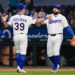 Aug 31, 2026; Arlington, Texas, USA; Texas Rangers third baseman Cody Freeman (39) and first baseman Jake Burger (21) react after defeating the Athletics at Globe Life Field. Mandatory Credit: Raymond Carlin III-Imagn Images