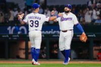 Aug 31, 2026; Arlington, Texas, USA; Texas Rangers third baseman Cody Freeman (39) and first baseman Jake Burger (21) react after defeating the Athletics at Globe Life Field. Mandatory Credit: Raymond Carlin III-Imagn Images