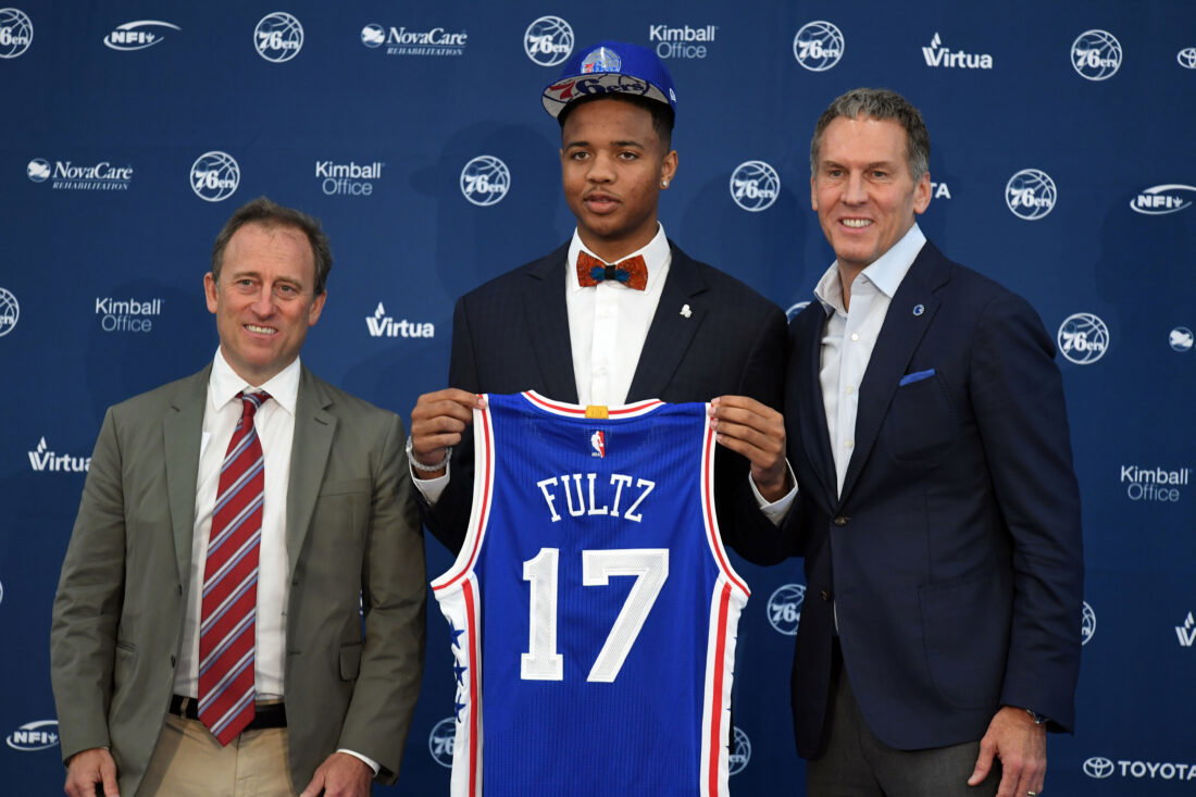 Jun 23, 2017; Camden, NJ, USA; Philadelphia 76ers number 1 overall draft pick Markelle Fultz (center) poses with owner Joshua Harris (left) and general manager Bryan Colangelo (right) during an introductory press conference at Philadelphia 76ers Training Complex. Mandatory Credit: James Lang-USA TODAY Sports
