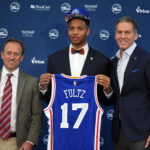 Jun 23, 2017; Camden, NJ, USA; Philadelphia 76ers number 1 overall draft pick Markelle Fultz (center) poses with owner Joshua Harris (left) and general manager Bryan Colangelo (right) during an introductory press conference at Philadelphia 76ers Training Complex. Mandatory Credit: James Lang-USA TODAY Sports