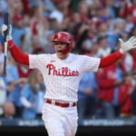 Oct 14, 2022; Philadelphia, Pennsylvania, USA; Philadelphia Phillies first baseman Rhys Hoskins celebrates after hitting a three-run home run against the Atlanta Braves during the 3rd inning in game three of the NLDS for the 2022 MLB Playoffs at Citizens Bank Park. Mandatory Credit: Bill Streicher-USA TODAY Sports