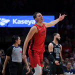 Dec 23, 2024; Miami, Florida, USA; Miami Heat forward Nikola Jovic (5) reacts after scoring against the Brooklyn Nets during the fourth quarter at Kaseya Center. Mandatory Credit: Sam Navarro-Imagn Images