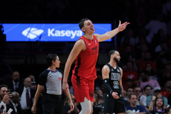 Dec 23, 2024; Miami, Florida, USA; Miami Heat forward Nikola Jovic (5) reacts after scoring against the Brooklyn Nets during the fourth quarter at Kaseya Center. Mandatory Credit: Sam Navarro-Imagn Images