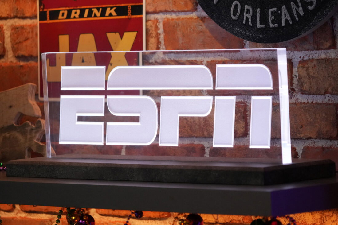 Feb 5, 2025; New Orleans, LA, USA; The ESPN logo at the Super Bowl LIX media center at the Ernest N. Morial Convention Center. Mandatory Credit: Kirby Lee-Imagn Images