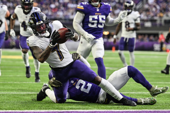 Nov 9, 2025; Minneapolis, Minnesota, USA; Baltimore Ravens wide receiver Rashod Bateman (7) is tackled by Minnesota Vikings cornerback Isaiah Rodgers (2) during the fourth quarter at U.S. Bank Stadium. Mandatory Credit: Jeffrey Becker-Imagn Images